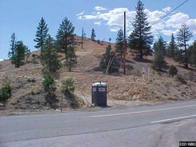 1410 St Rt 341 Reno Nv 89521 Reno, NV 89521 - Photo 3 of 4 a view of a water fountain in front of a house