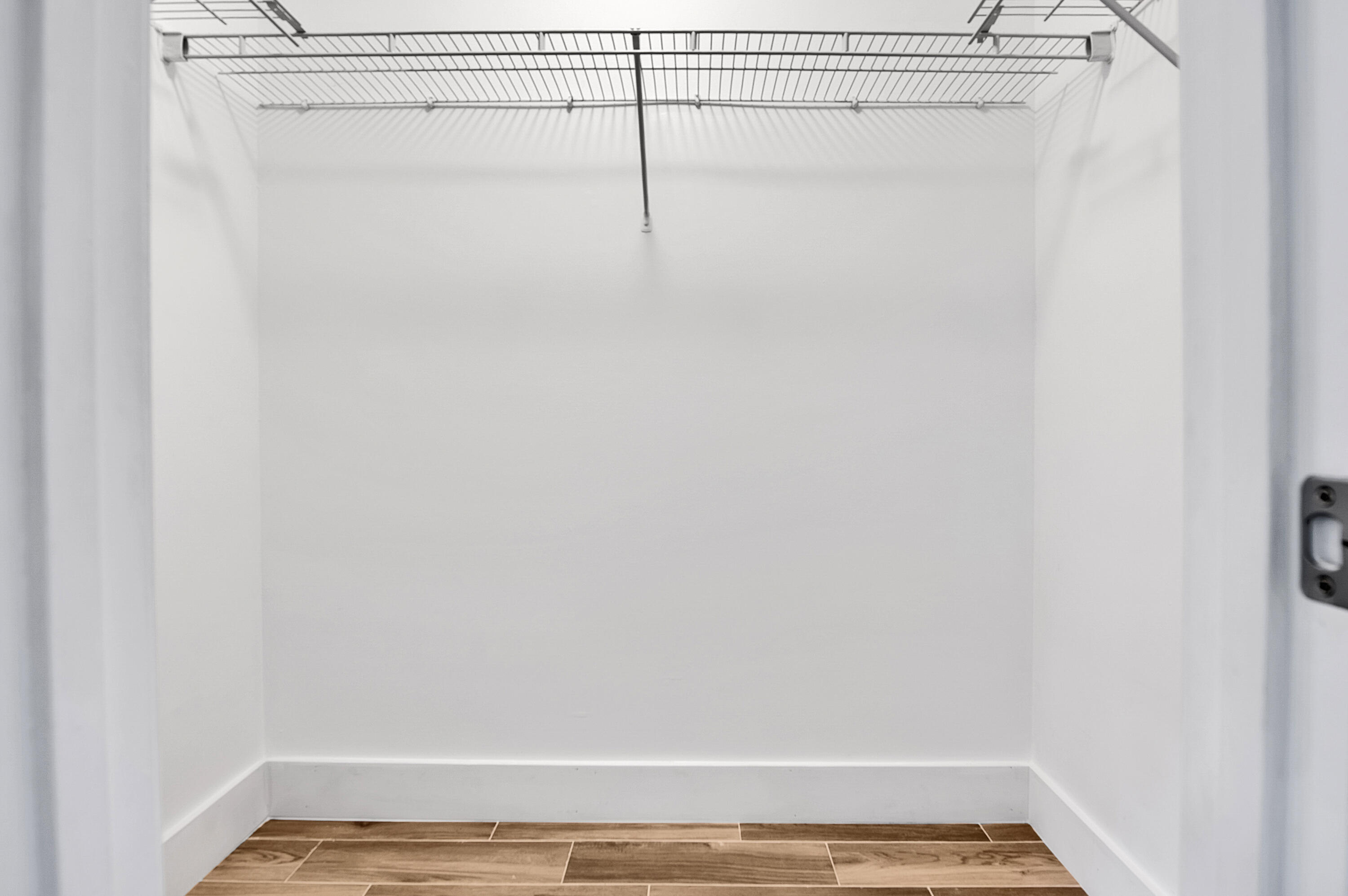 1275 Crystal Way, Unit K Delray Beach, FL 33444 - Photo 27 of 45 a view of a room with wooden floor