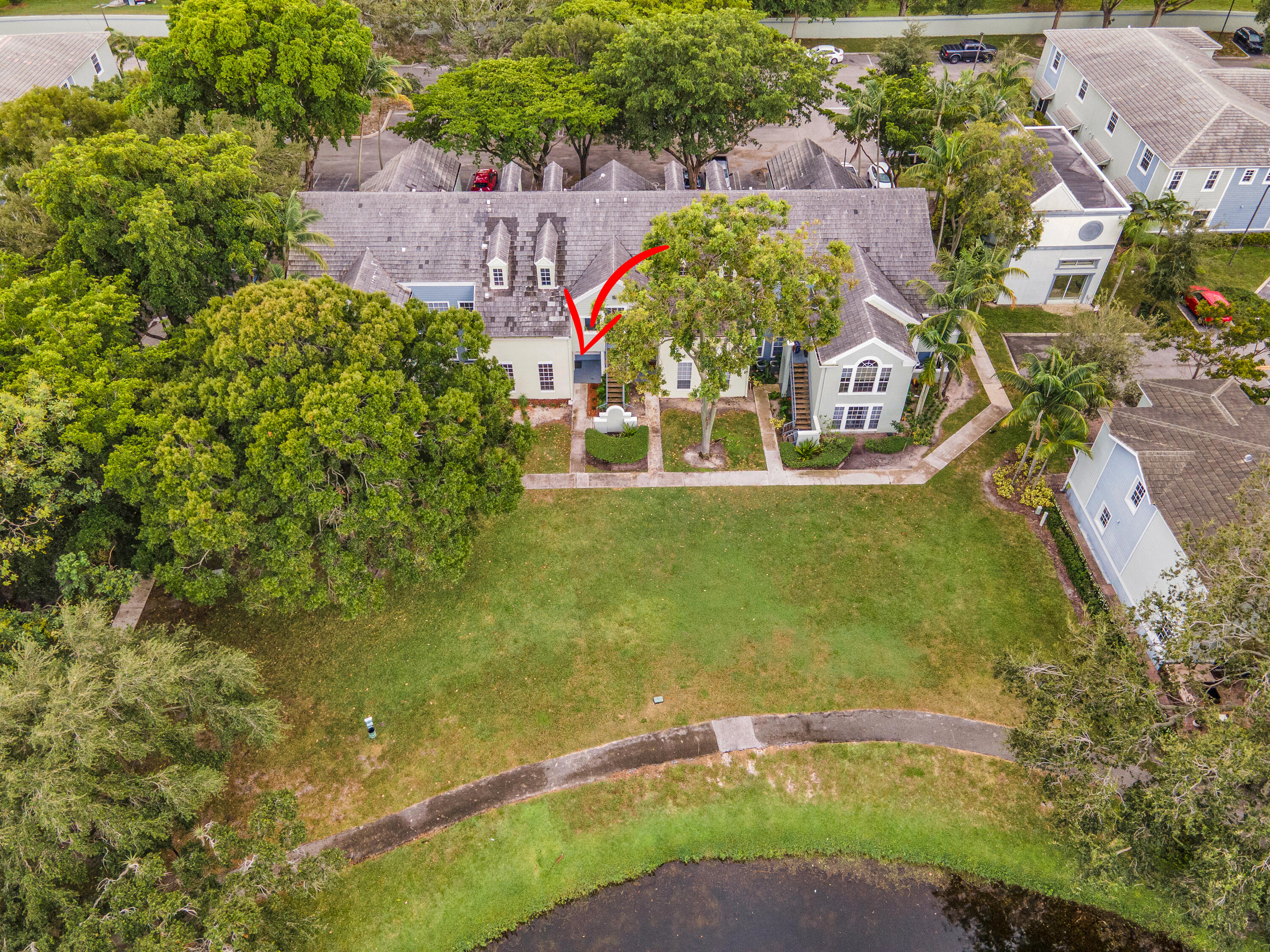 1275 Crystal Way, Unit K Delray Beach, FL 33444 - Photo 38 of 45 an aerial view of residential houses with outdoor space and trees