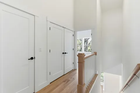 a view of a bathroom from a hallway