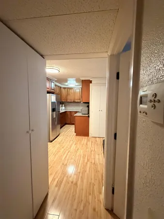 a room with a bed and a view of bathroom