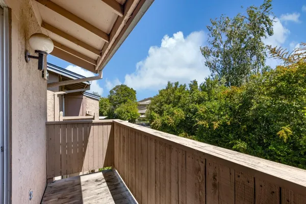 a balcony view with an outdoor space