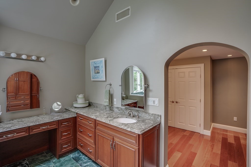 6 Braeburn Road Chelmsford, MA 01824 - Photo 23 of 42 a kitchen with granite countertop stainless steel appliances stove and sink