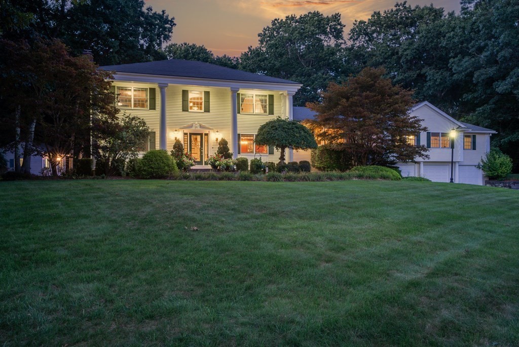 6 Braeburn Road Chelmsford, MA 01824 - Photo 38 of 42 a front view of a house with a garden