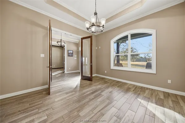 a view of livingroom with hardwood floor and hallway