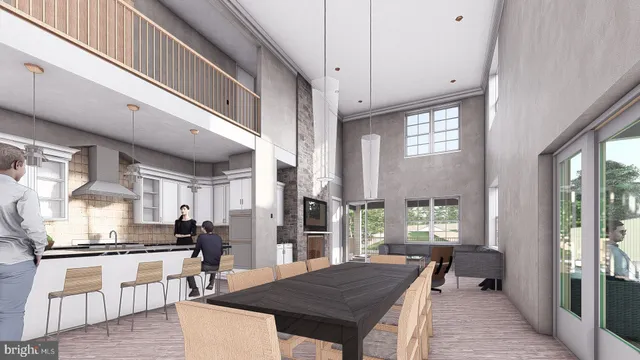 a kitchen with stainless steel appliances granite countertop a stove refrigerator and cabinets