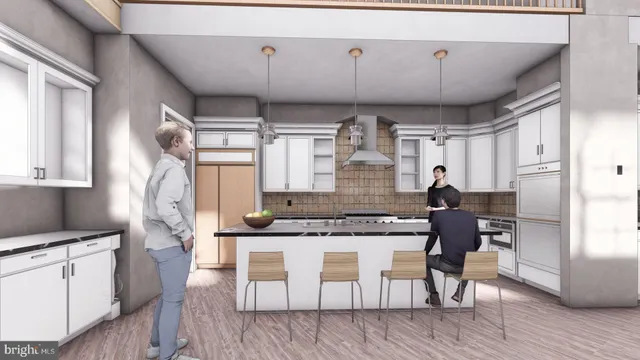 a kitchen with a table chairs refrigerator and cabinets