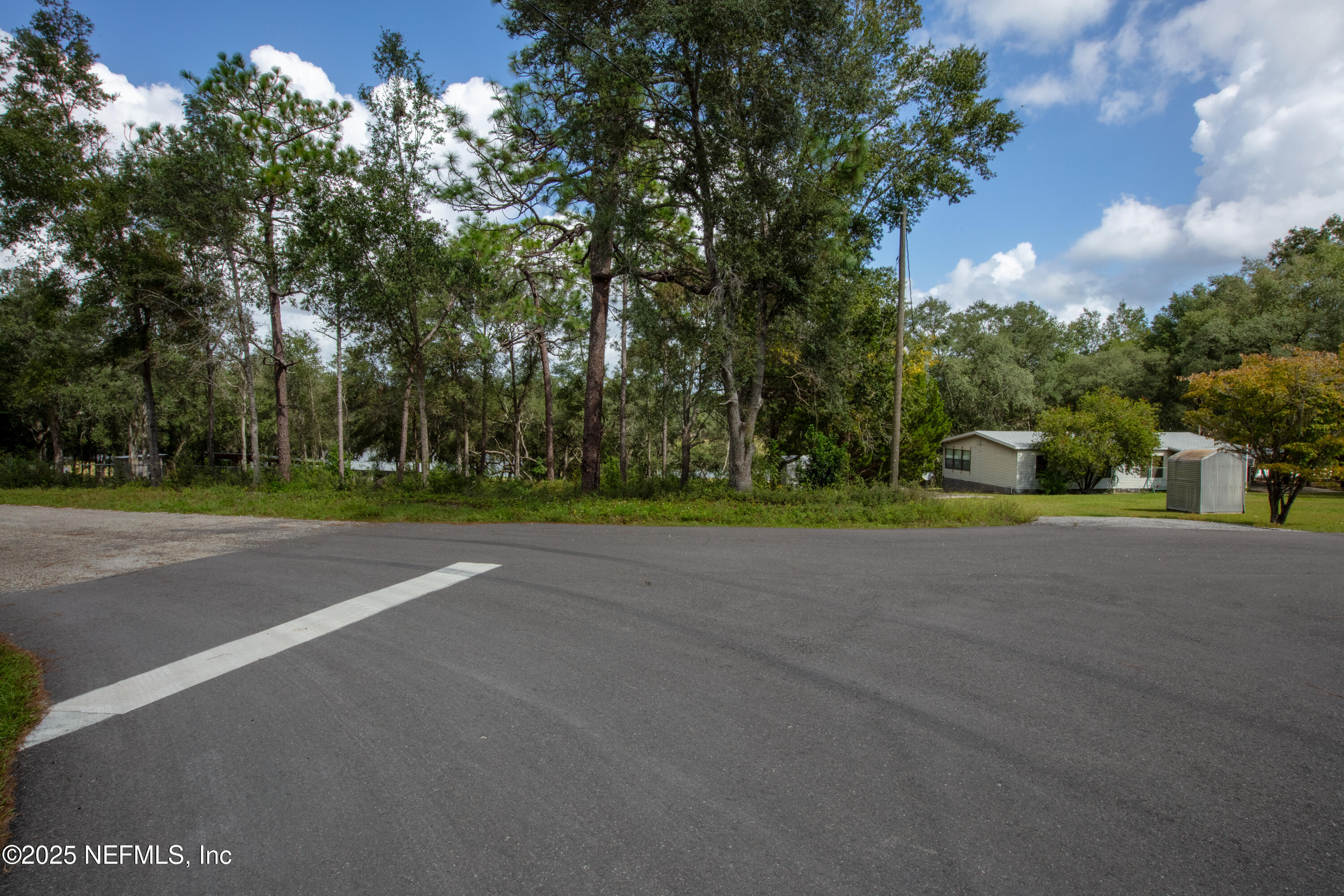6956 Deer Springs Road Keystone Heights, FL 32656 - Photo 5 of 10 a view of road and trees