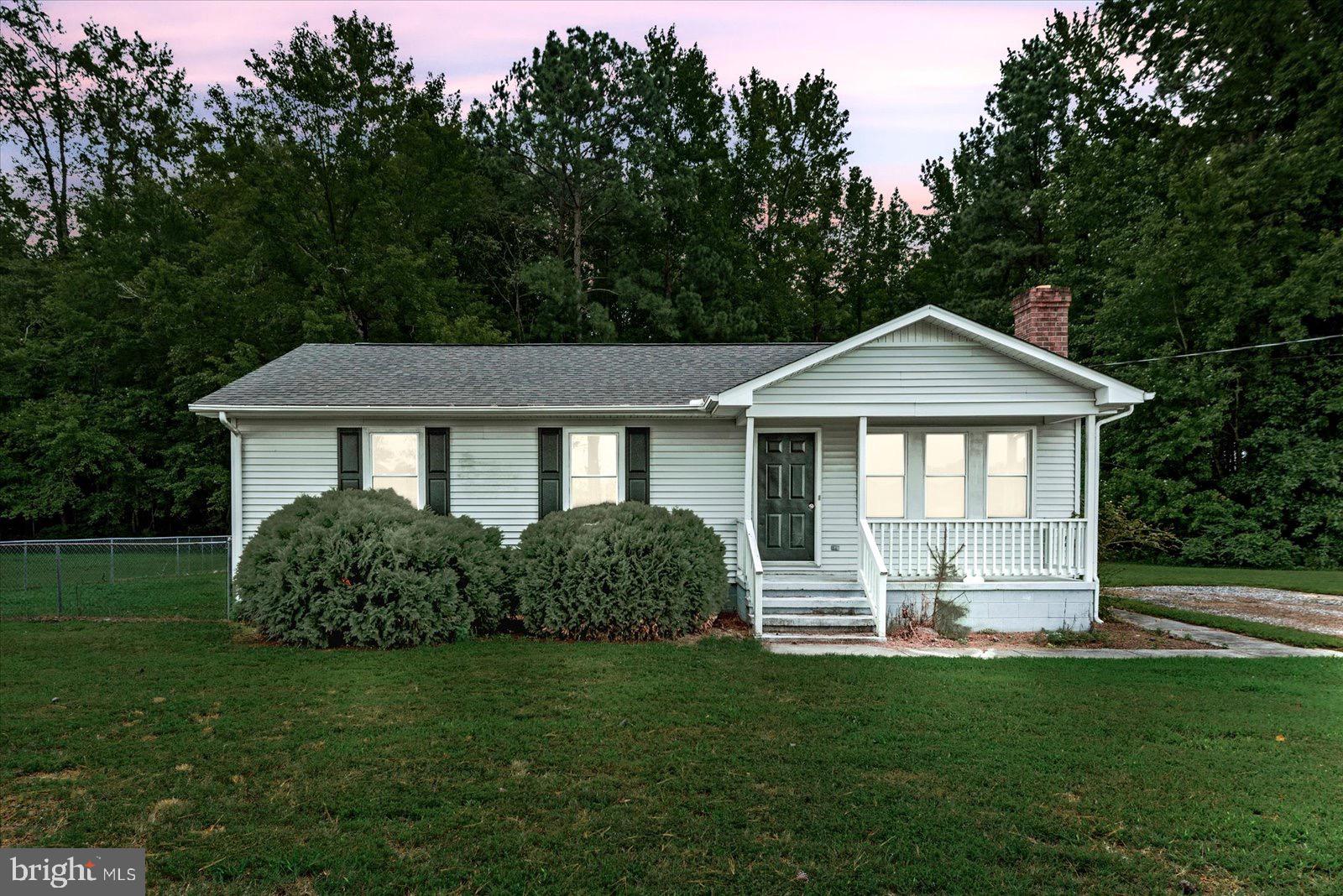 2010 Lake Road Lottsburg, VA 22511 - Photo 3 of 18 a front view of a house with a yard