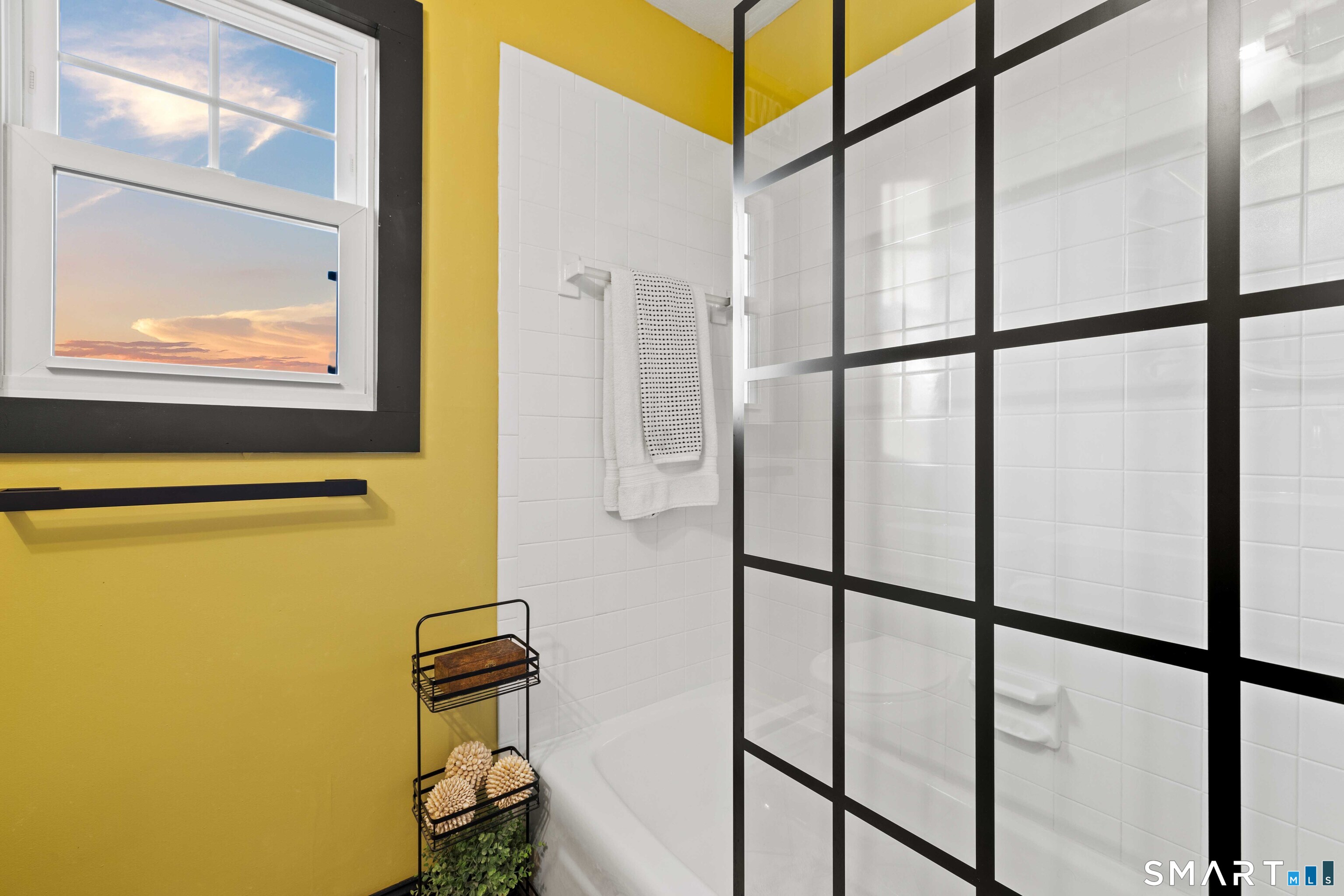 129 Nehantic Trail Old Saybrook, CT 06475 - Photo 15 of 28 a bathroom with a window