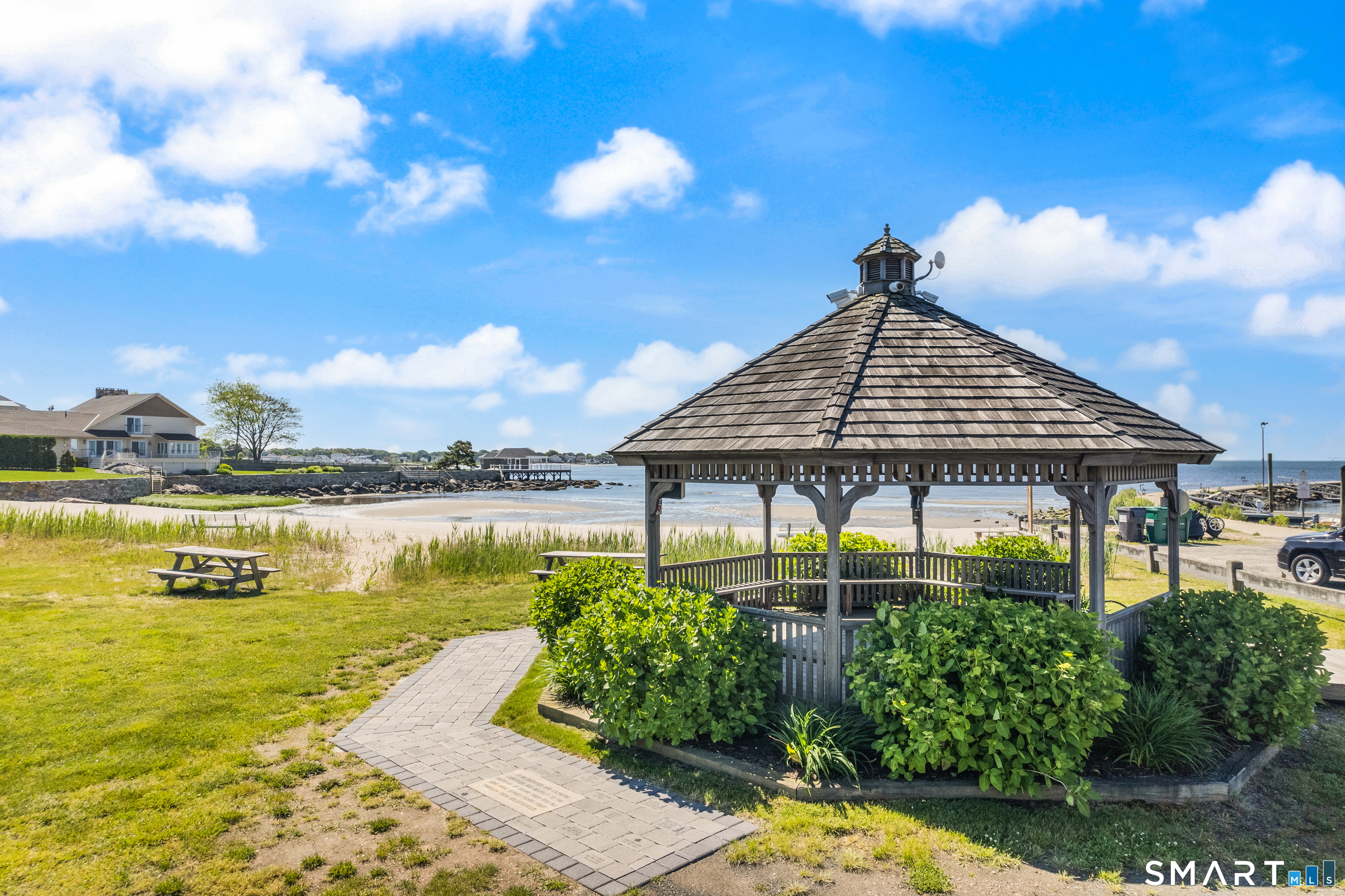 129 Nehantic Trail Old Saybrook, CT 06475 - Photo 27 of 28 a house view with a lake view