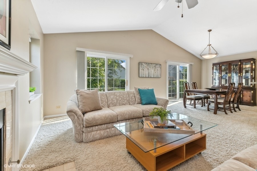 393 Bentley Place Buffalo Grove, IL 60089 - Photo 5 of 16 a living room with furniture and wooden floor