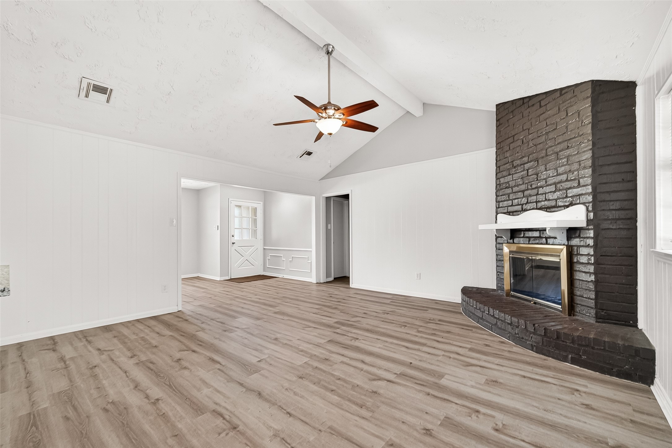 23235 Earlmist Drive Spring, TX 77373 - Photo 4 of 26 Den has fireplace and high ceilings
