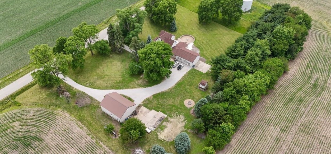 382 Keigwin Road Walnut, IL 61376 - Photo 12 of 49 an aerial view of a house with a yard and trees all around