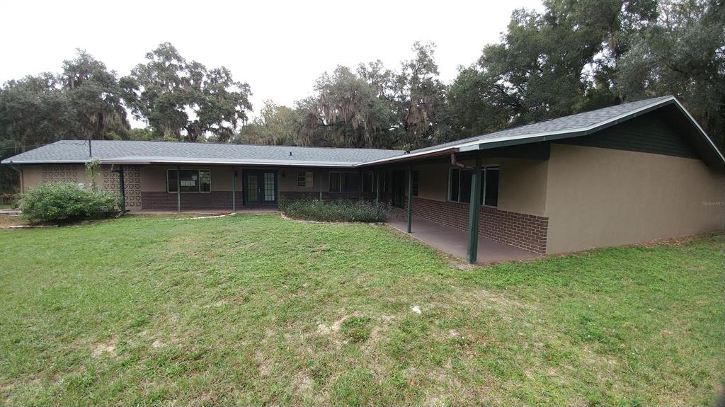 10555 Southeast Sunset Harbor Road Summerfield, FL 34491 - Photo 1 of 1 1116191037c