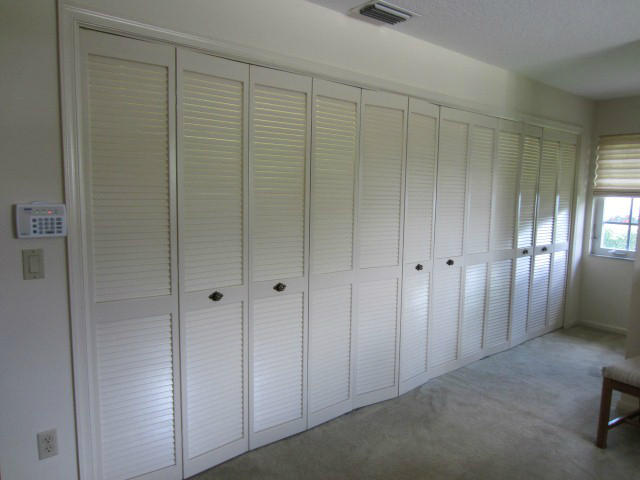 253 Puritan Road West Palm Beach, FL 33405 - Photo 19 of 43 MASTER BEDROOM WALL OF CLOSETS