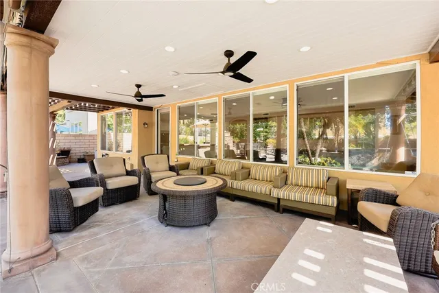 an aerial view of a house with outdoor space and lake view