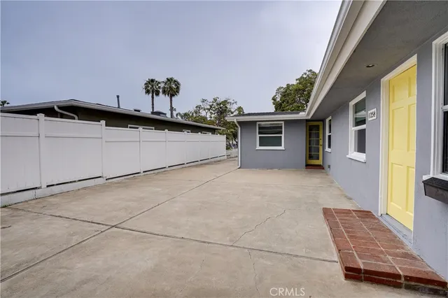 a front view of a house with a garage