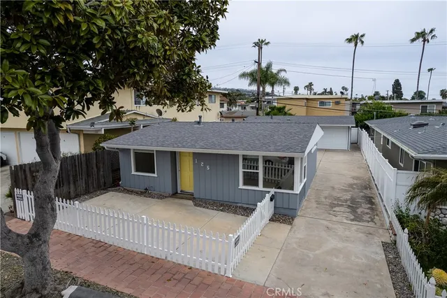 a house view with a garden space