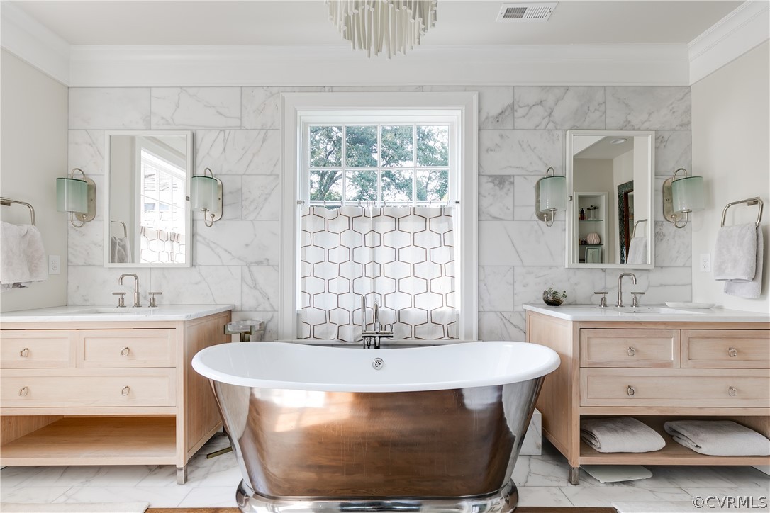 108 Penshurst Road Richmond, VA 23221 - Photo 31 of 50 Exquisite Primary Bathroom with Marble Surround, His and Her Sinks, Cast Iron Tub and Coffee Nook