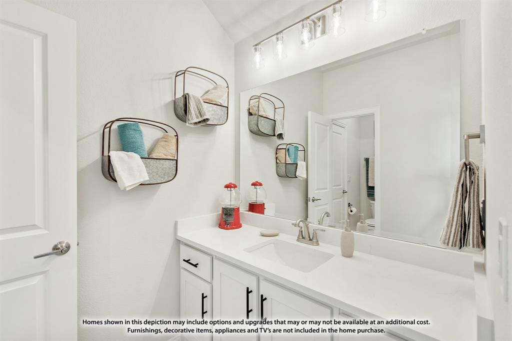 12709 Cactus Court Godley, TX 76044 - Photo 36 of 40 a bathroom with a sink and a mirror
