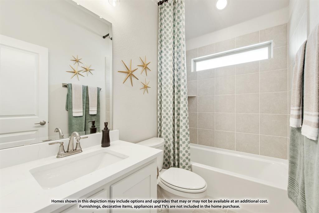 12709 Cactus Court Godley, TX 76044 - Photo 39 of 40 a bathroom with a bathtub a sink and a shower