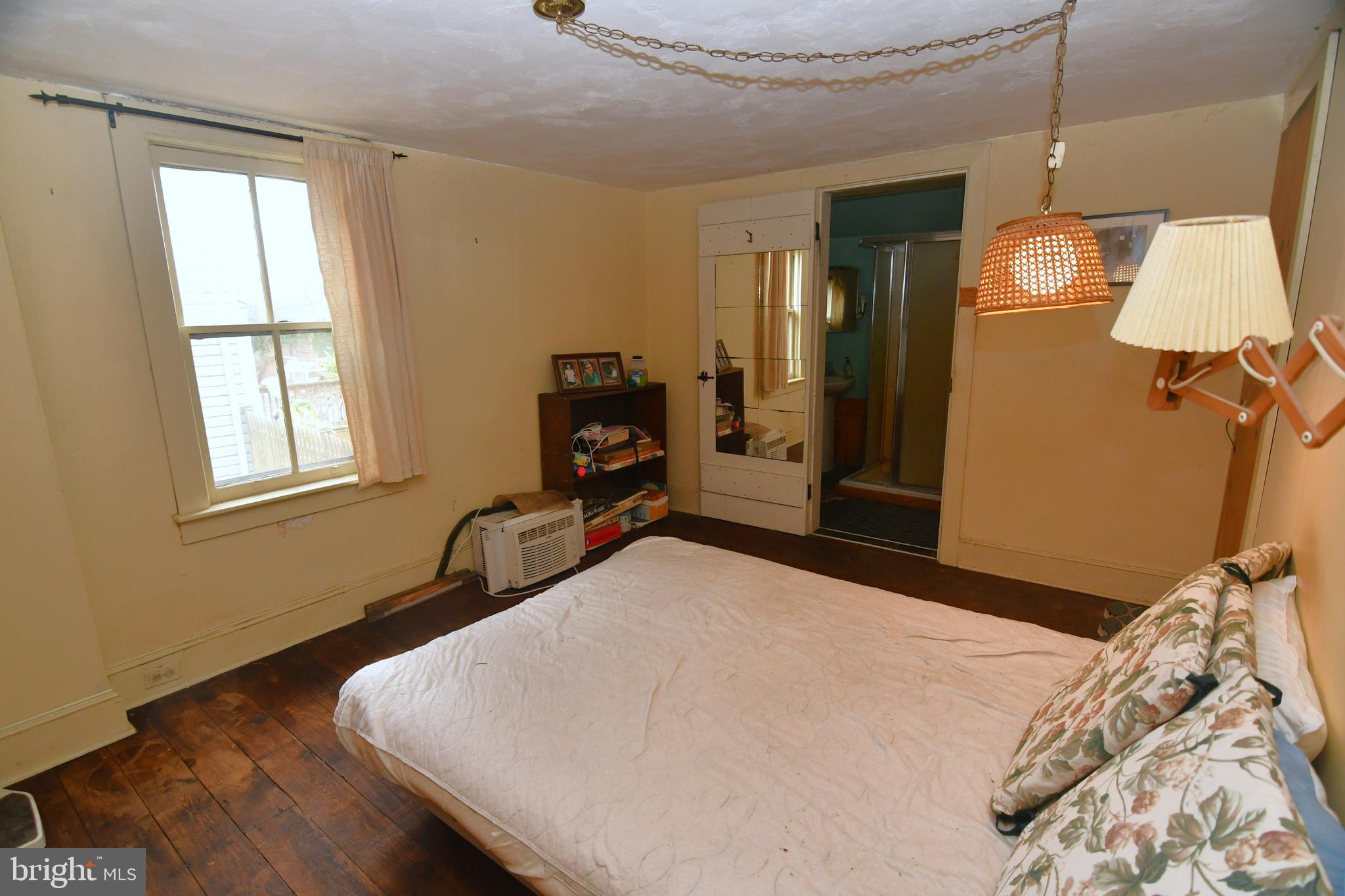 3923 Ferry Road Doylestown, PA 18902 - Photo 21 of 27 a bedroom with a bed and wooden floor