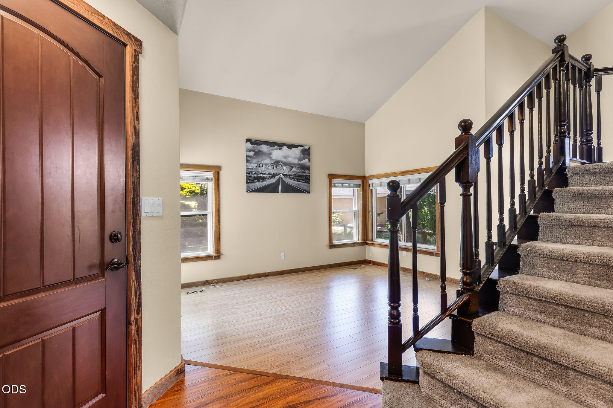 2486 Southwest Valleyview Drive Redmond, OR 97756 - Photo 6 of 55 a view of a hallway with wooden floor and staircase