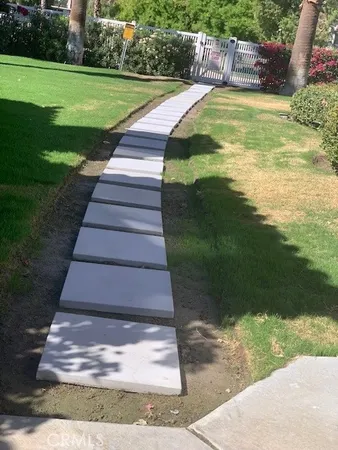 a view of a back yard of the house