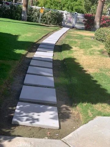 a view of a back yard of the house