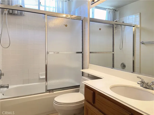 a utility room with a sink washer and dryer