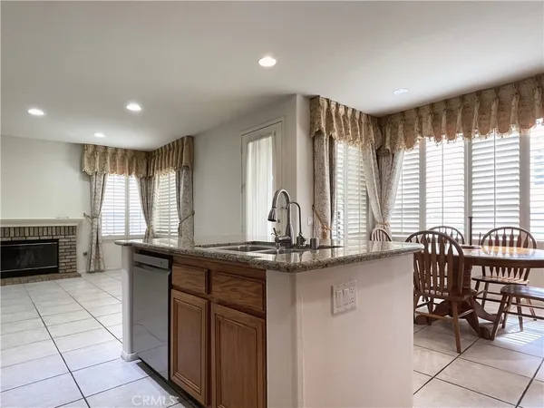 a view of an empty room with a cabinet