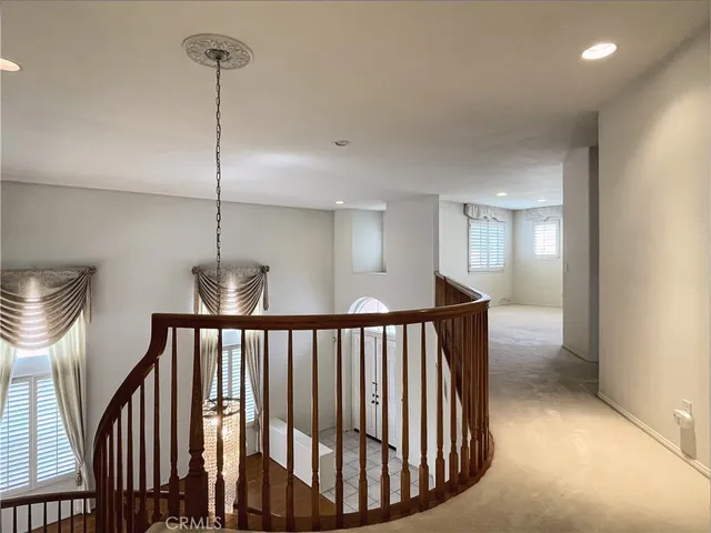 a spacious bathroom with a granite countertop sink mirror and double