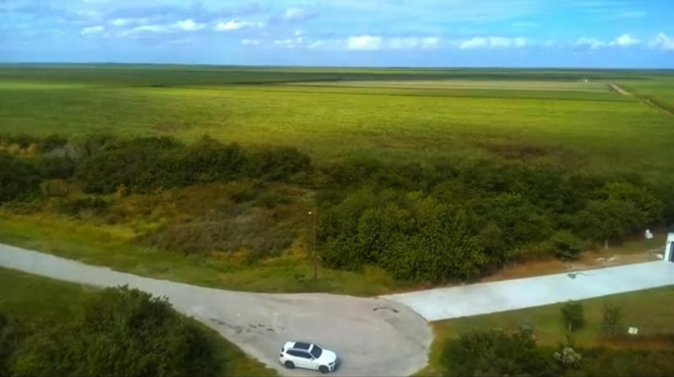 3508 Yucca Lane Clewiston, FL 33440 - Photo 4 of 5 a view of an ocean and a yard