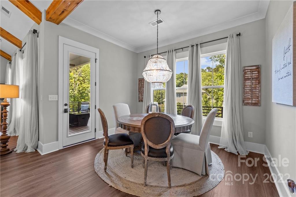 11099 Pheasant Run Tega Cay, SC 29708 - Photo 15 of 47 a dining room with furniture window wooden floor