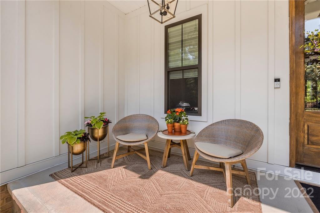 11099 Pheasant Run Tega Cay, SC 29708 - Photo 2 of 47 a chair and table in a room