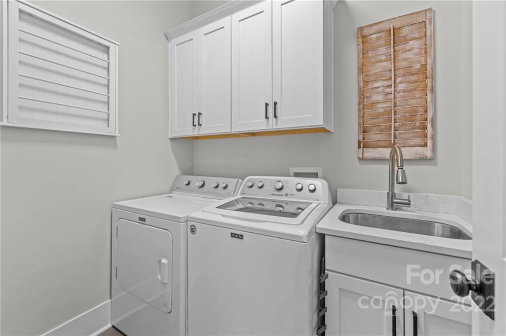 11099 Pheasant Run Tega Cay, SC 29708 - Photo 29 of 47 a utility room with dryer and washer