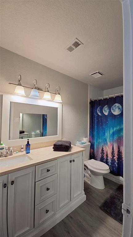 2240 Tarpley Road, Unit 134 Carrollton, TX 75006 - Photo 13 of 23 a bathroom with a double vanity sink and a mirror