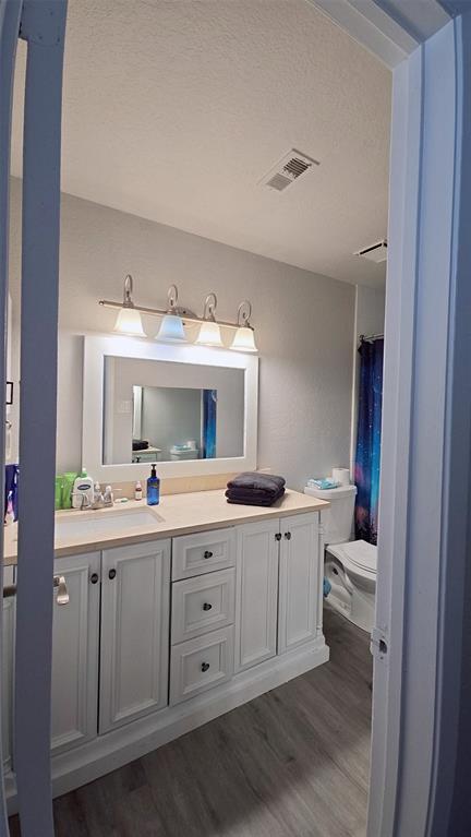 2240 Tarpley Road, Unit 134 Carrollton, TX 75006 - Photo 14 of 23 a view with cabinets a sink and dishwasher in a room