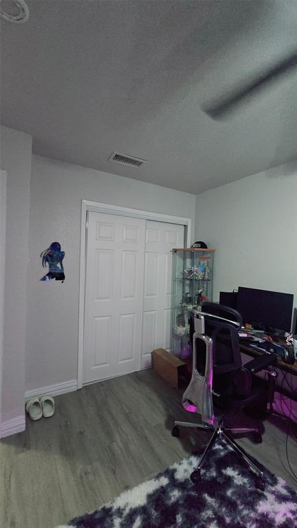 2240 Tarpley Road, Unit 134 Carrollton, TX 75006 - Photo 16 of 23 a room with toys and wooden floor