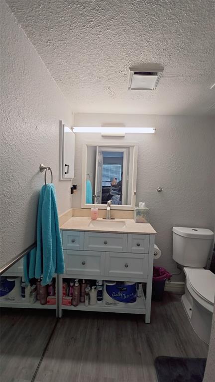2240 Tarpley Road, Unit 134 Carrollton, TX 75006 - Photo 18 of 23 a bathroom with a sink and a mirror