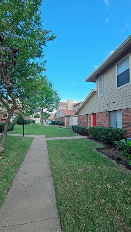 2240 Tarpley Road, Unit 134 Carrollton, TX 75006 - Photo 23 of 23 a view of a patio with a yard