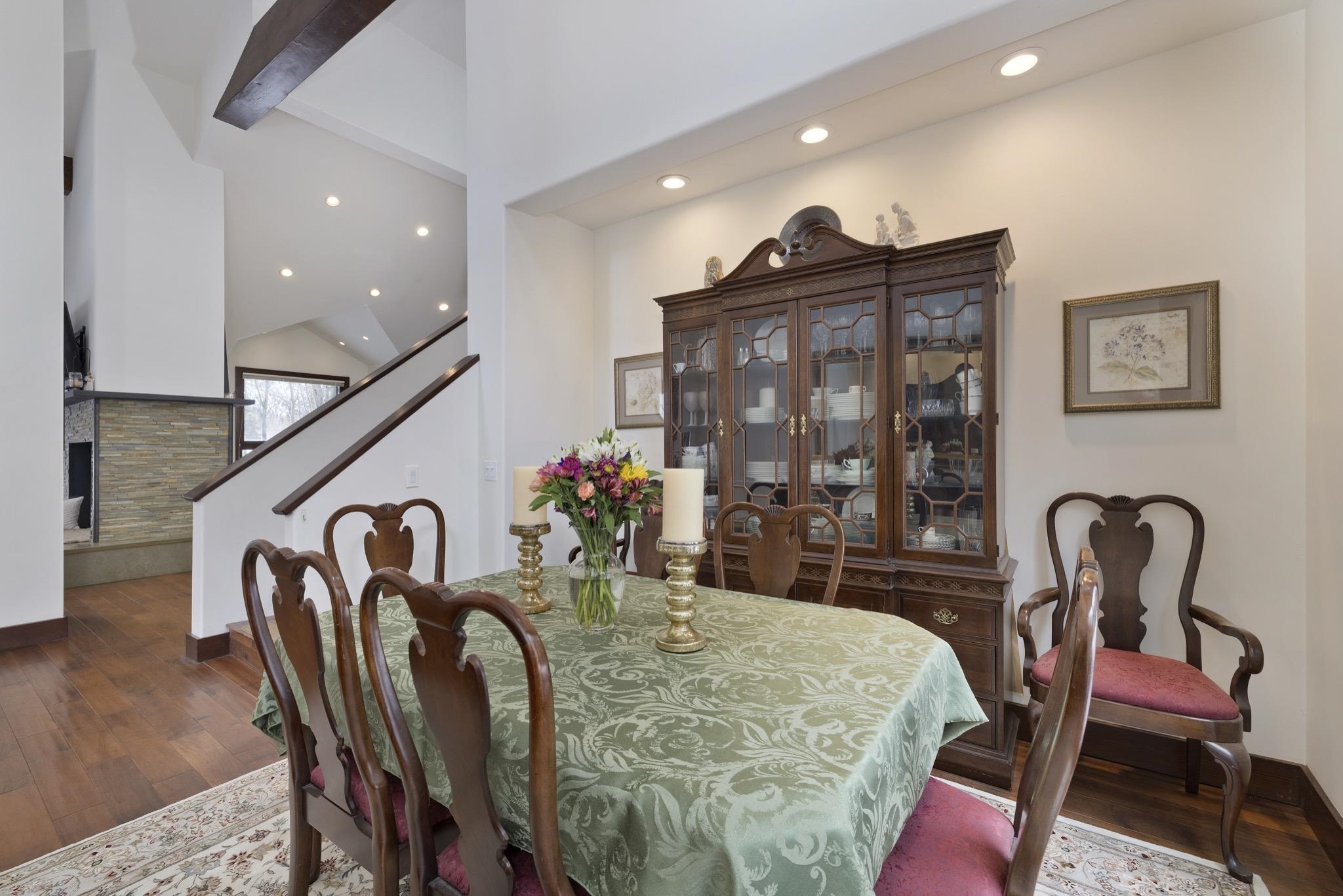 310 Ranch Road Mammoth Lakes, CA 93546 - Photo 13 of 40 Dining area with dark wood-type flooring, beam ceiling, and recessed lighting