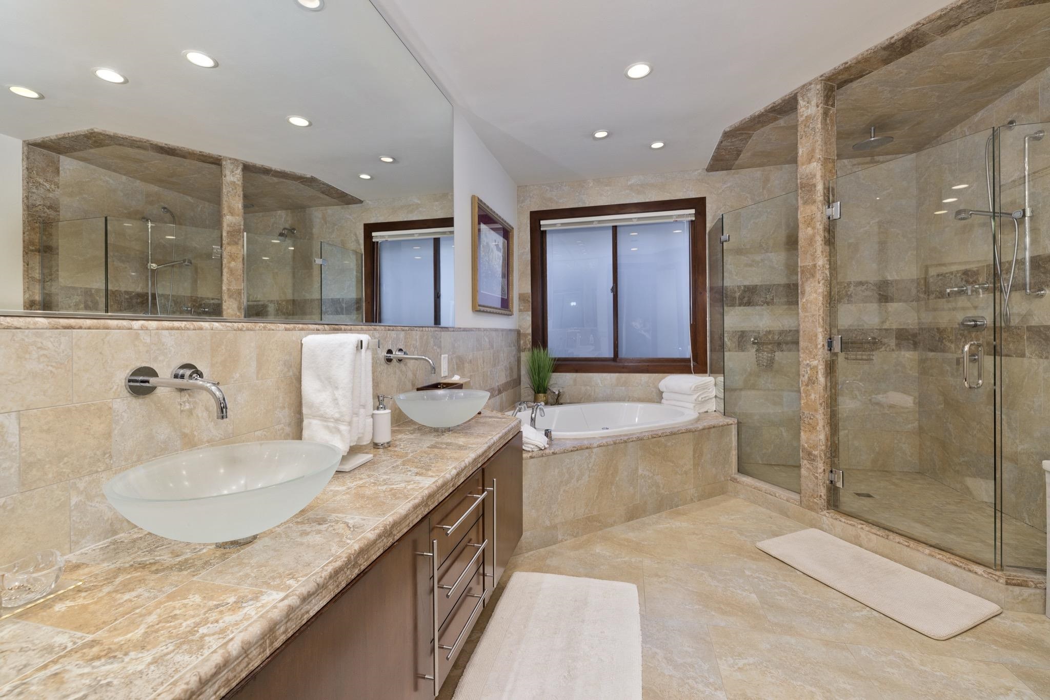 310 Ranch Road Mammoth Lakes, CA 93546 - Photo 18 of 40 Full bath featuring double vanity, a garden tub, a stall shower, tile walls, and recessed lighting