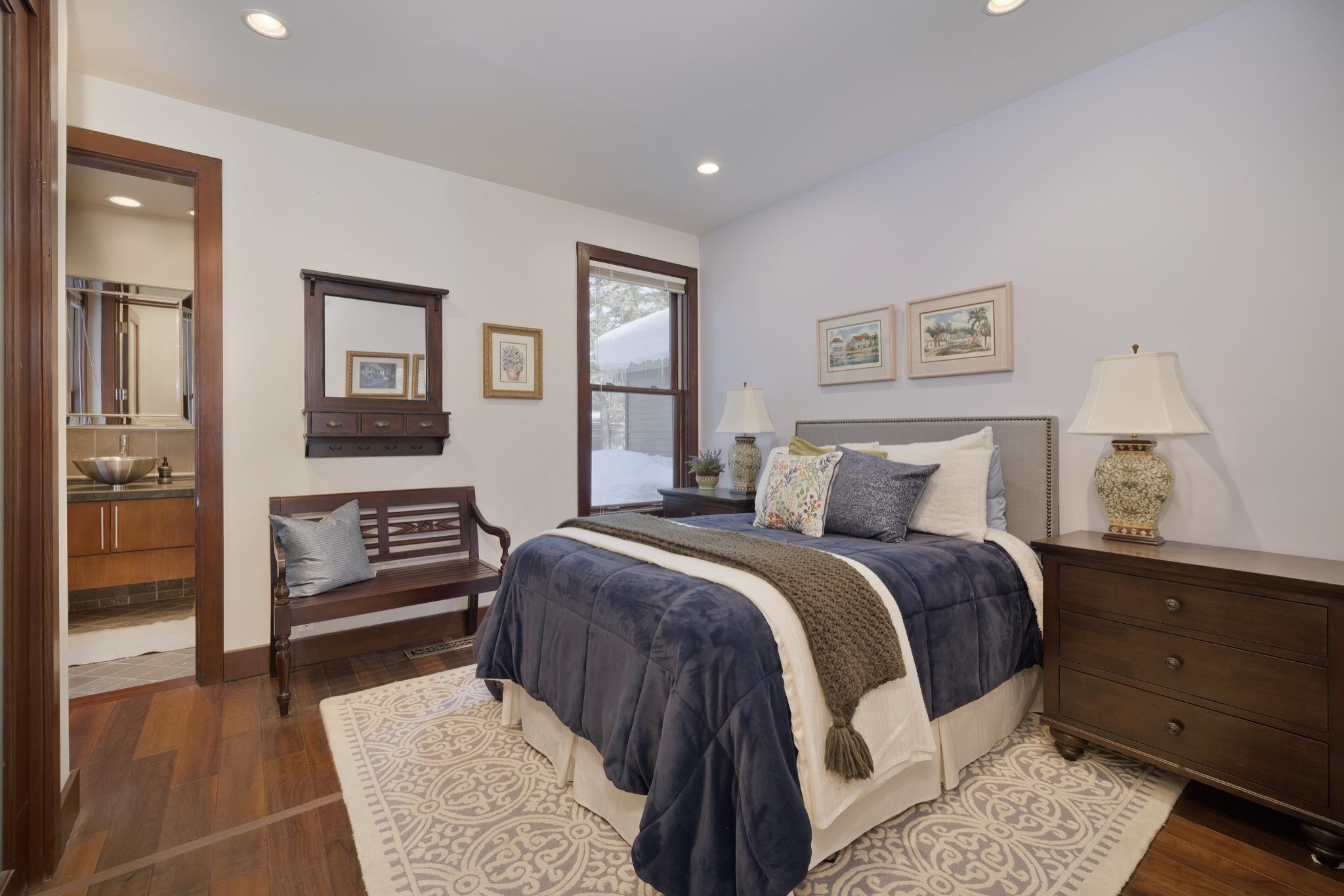 310 Ranch Road Mammoth Lakes, CA 93546 - Photo 22 of 40 Bedroom featuring dark wood-type flooring, recessed lighting, and connected bathroom