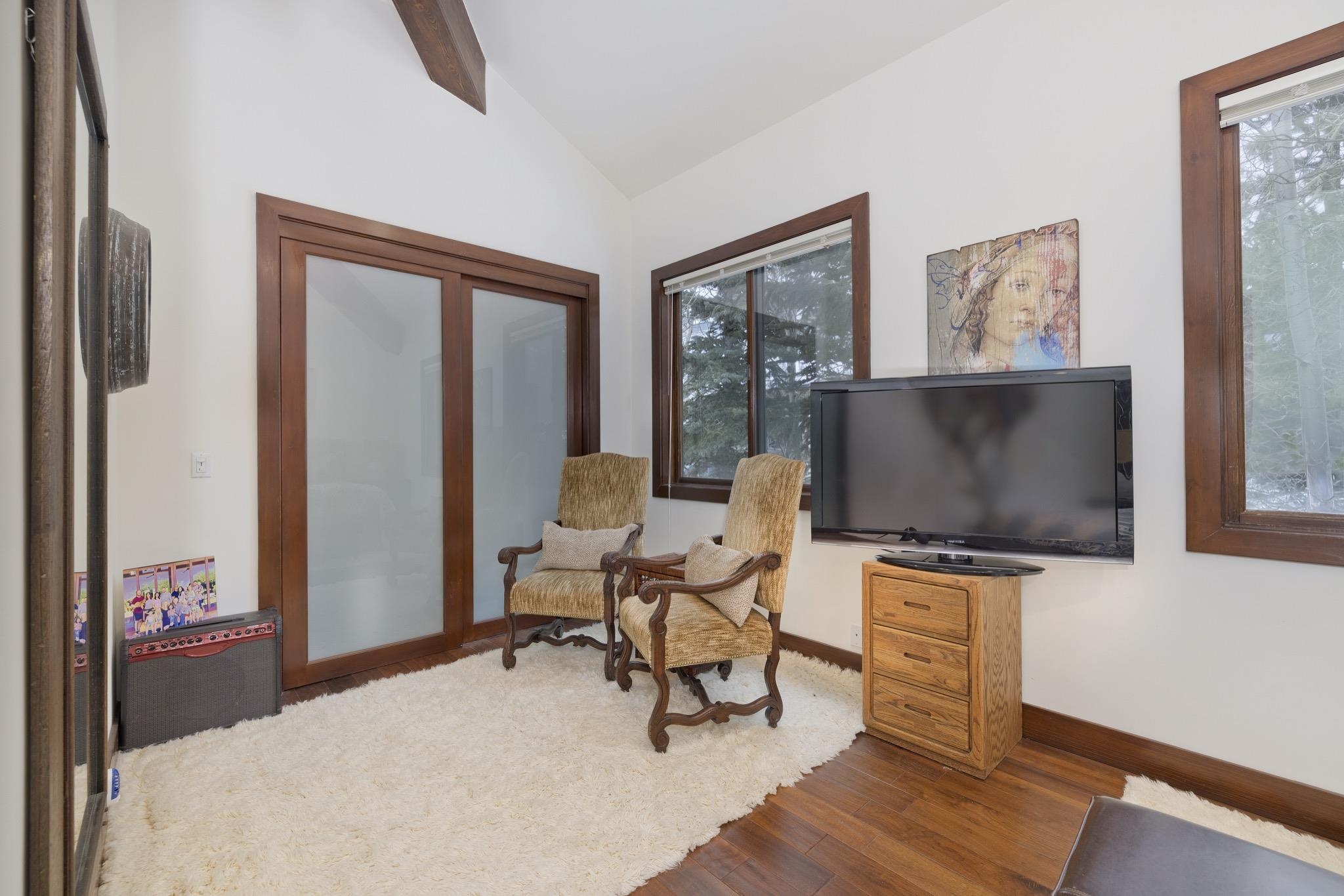 310 Ranch Road Mammoth Lakes, CA 93546 - Photo 27 of 40 Living area featuring hardwood / wood-style flooring and lofted ceiling