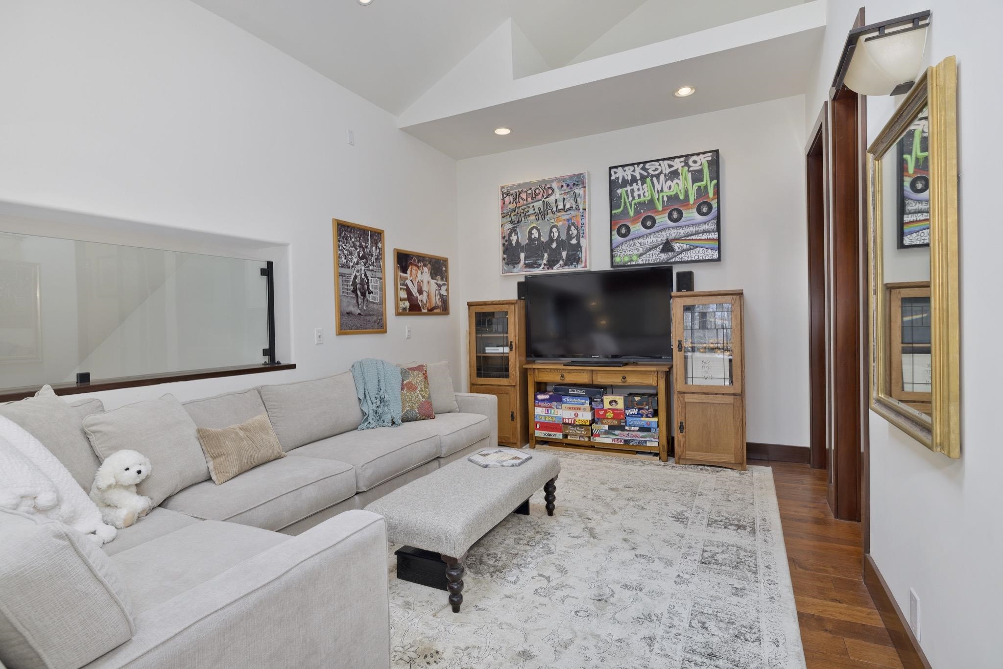 310 Ranch Road Mammoth Lakes, CA 93546 - Photo 28 of 40 Living area with wood finished floors, lofted ceiling, and recessed lighting
