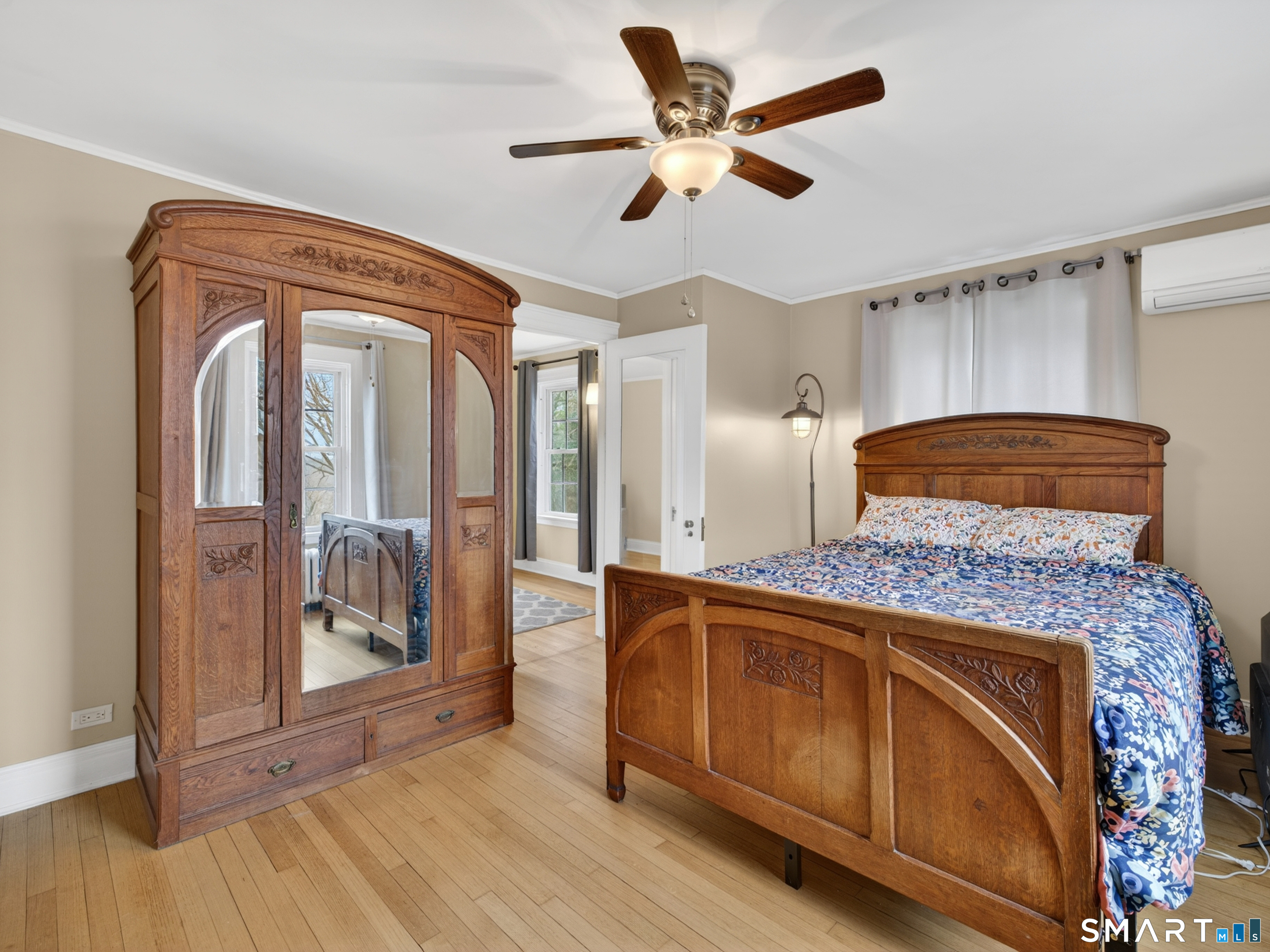 76 Starr Hill Road Groton, CT 06340 - Photo 26 of 40 a bedroom with a bed and a mirror