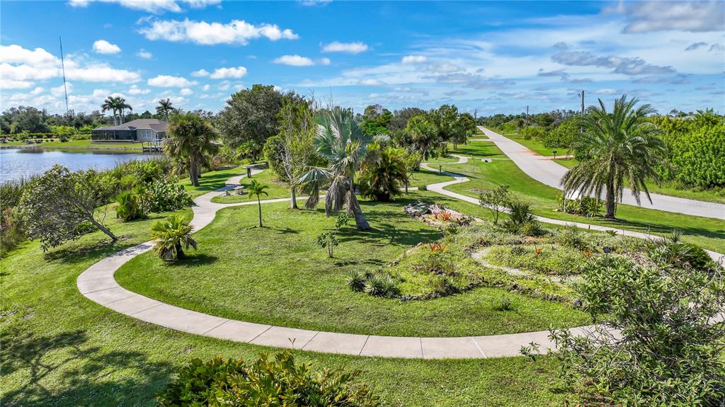 9357 Agate Street Port Charlotte, FL 33981 - Photo 9 of 17 a view of a lake from a yard