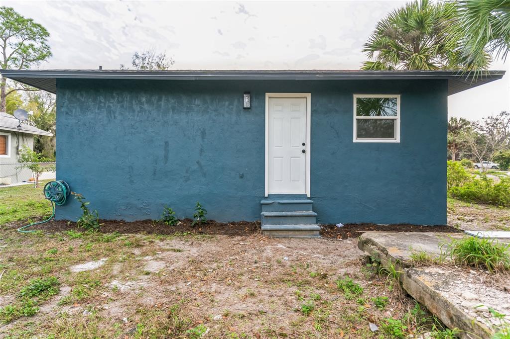 224 Singleton Avenue Arcadia, FL 34266 - Photo 22 of 24 a backyard of a house